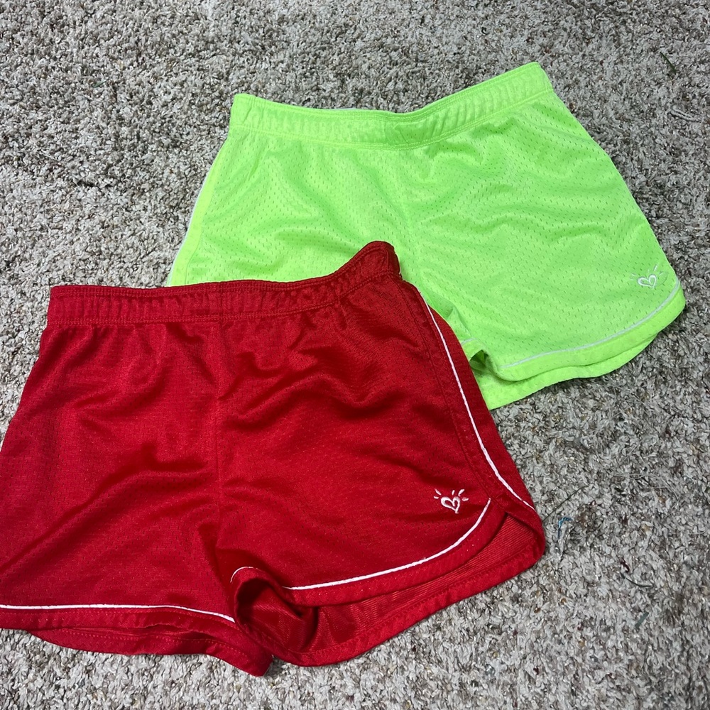 Lot girls athletic shorts size 10 Justice red and lime green